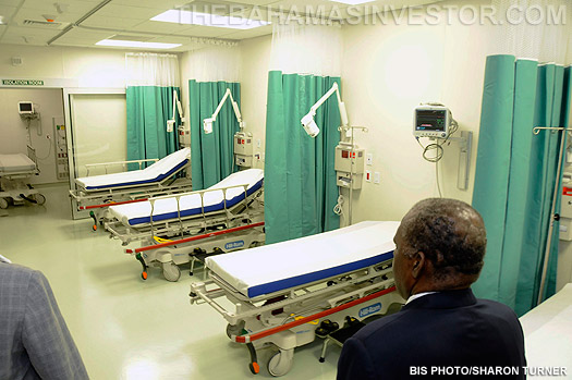 Prime Minister Hubert Ingraham views Rand Memorial Hospital beds