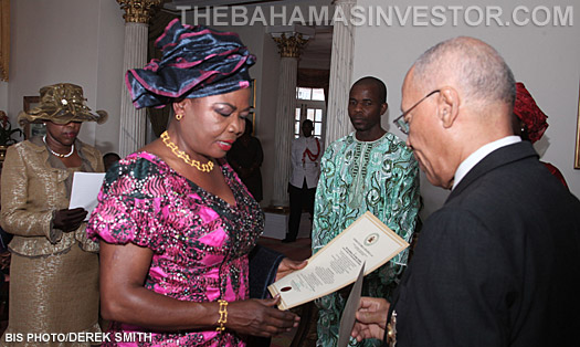 Laraba Elsie-Bhutto (left) presents her Letters of Commission