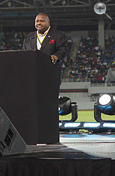 Sports Minister Charles Maynard addresses the audience.