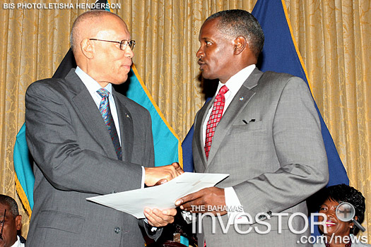 Senator Thomas Desmond Bannister receives his Instrument of Appointment.