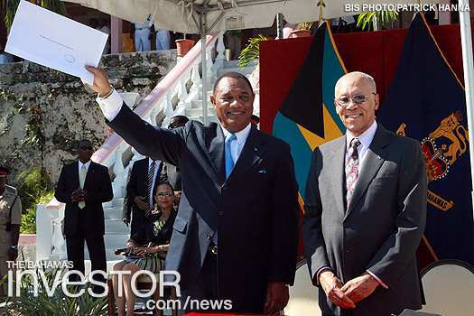 Perry Christie waves his instrument of appointment