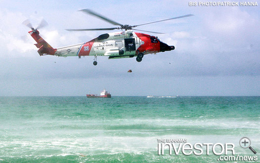 US Coast Guard helicopter drops a wreath