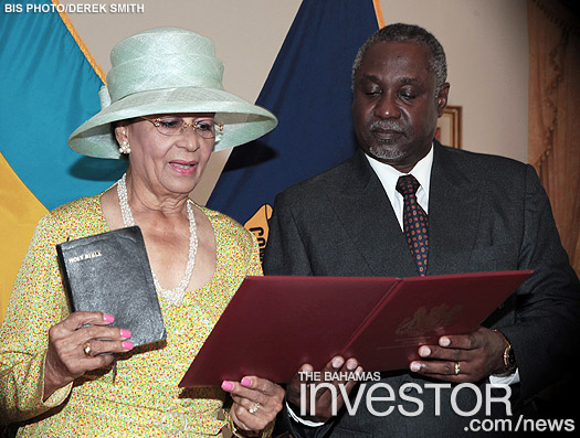 Dame Marguerite Pindling is pictured being sworn-in as Deputy to the Governor General