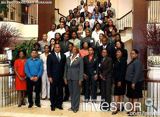 Standing on the staircase at the British Colonial Hilton are the 61 participants