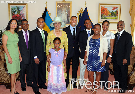 pictured with her children and grand children in the Drawing Room at Government House