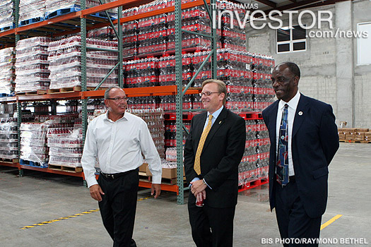 Minister of Financial Services Ryan Pinder takes a tour of the new Coca-Cola plant