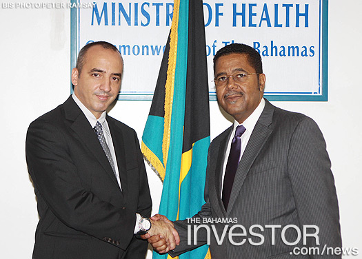 Minister of Health Perry Gomez welcomes Ernesto Soberon Guzman