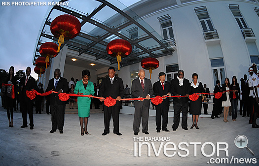 Officials and dignitaries cut the ribbon