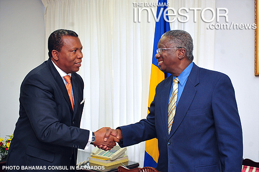 Picewell Forbes (left) presents credentials 1