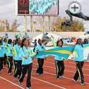 athletes parade around the track
